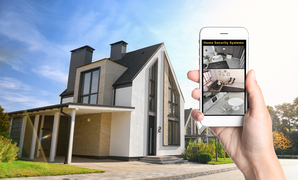 Alarm,System.,Woman,Monitoring,Modern,Cctv,Cameras,On,Smartphone,Near